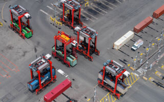 Collision warning system improves safety of manual straddle carriers